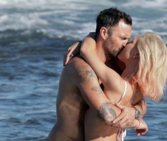 George Green son Brian Austin Green and Sharna Burgess sharing a steamy kiss.